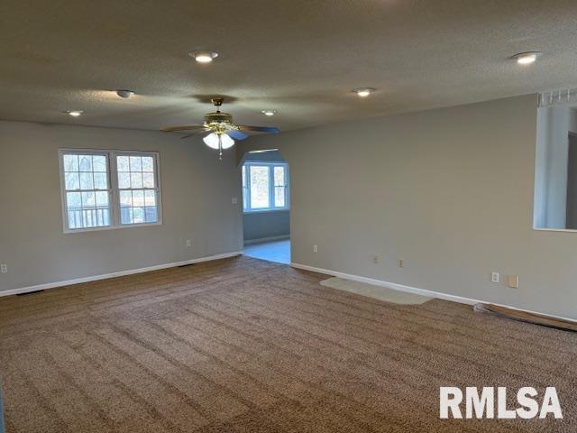 14892 Fowler School Rd, Marion, IL 62959 - empty room featuring carpet floors and ceiling fan