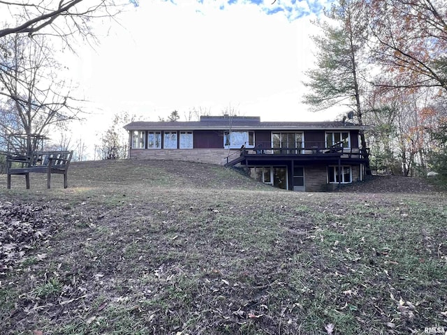 rear view of house with a deck