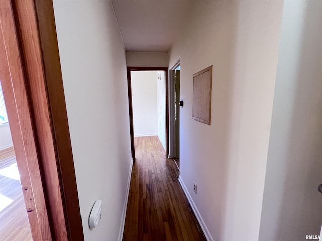 hallway featuring hardwood / wood-style floors