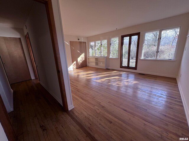 interior space with dark hardwood / wood-style flooring