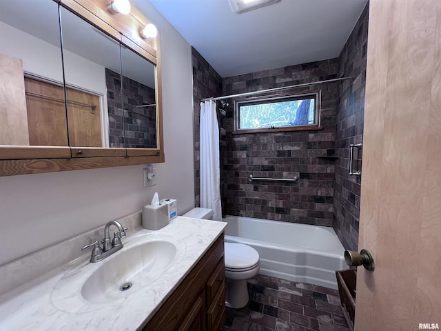 full bathroom featuring shower / tub combo, vanity, and toilet