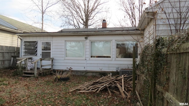 view of home's exterior with central AC unit