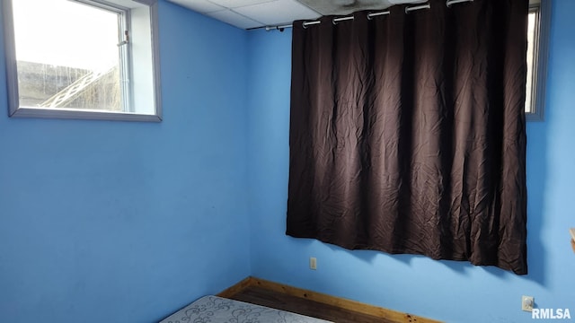 empty room with a drop ceiling