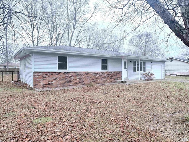 ranch-style home with a garage