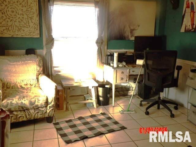 home office with light tile patterned floors