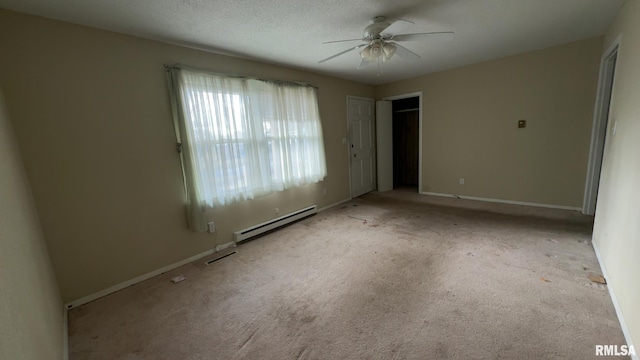 unfurnished bedroom with light colored carpet, ceiling fan, and a baseboard heating unit