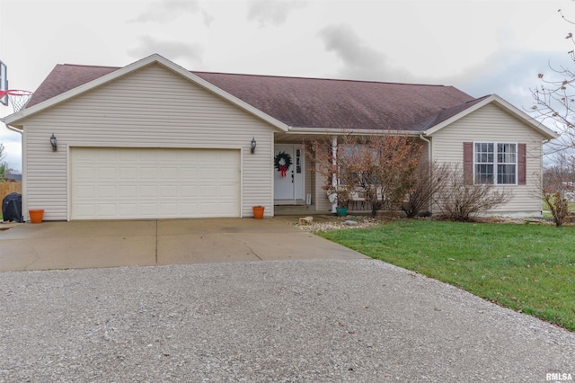 ranch-style house with a front yard and a garage