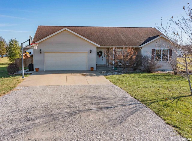 ranch-style home featuring a front yard and a garage