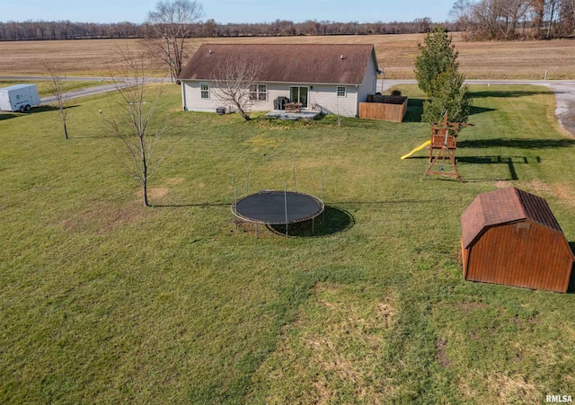 birds eye view of property featuring a rural view