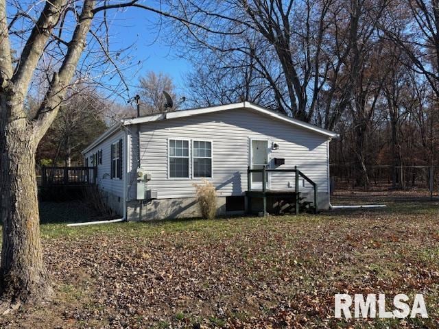 view of front of property with a deck