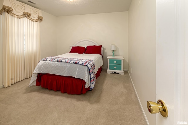 bedroom featuring carpet flooring