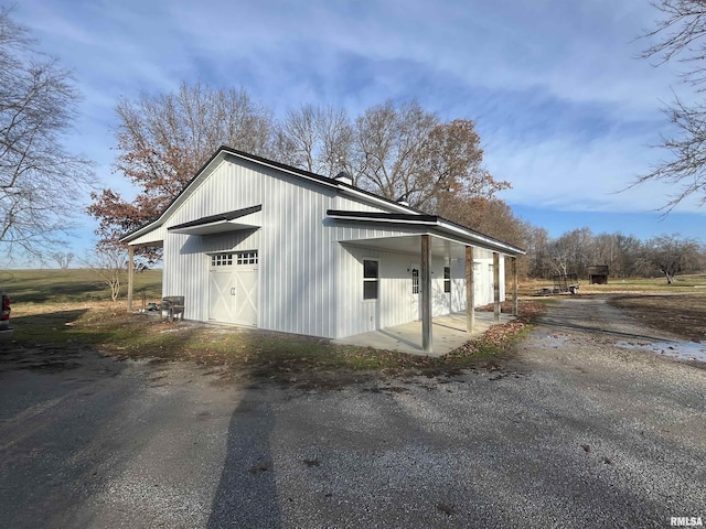 view of outdoor structure with a garage