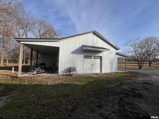 view of outbuilding with a garage