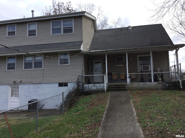 view of front of home featuring cooling unit and a porch