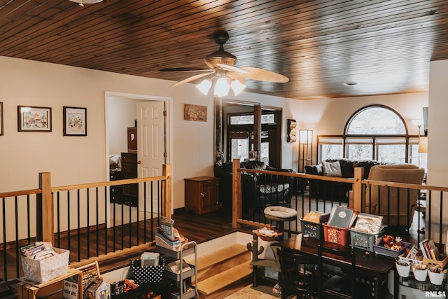 interior space featuring ceiling fan, hardwood / wood-style flooring, and wooden ceiling