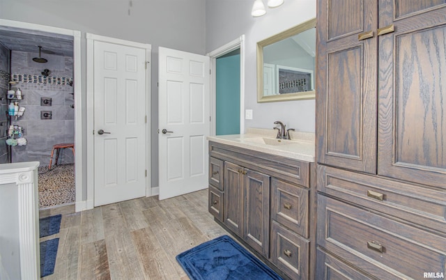 bathroom with wood-type flooring and vanity