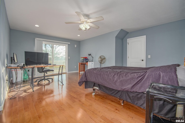 bedroom featuring access to outside, ceiling fan, and light hardwood / wood-style flooring