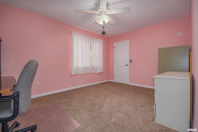 carpeted office with ceiling fan