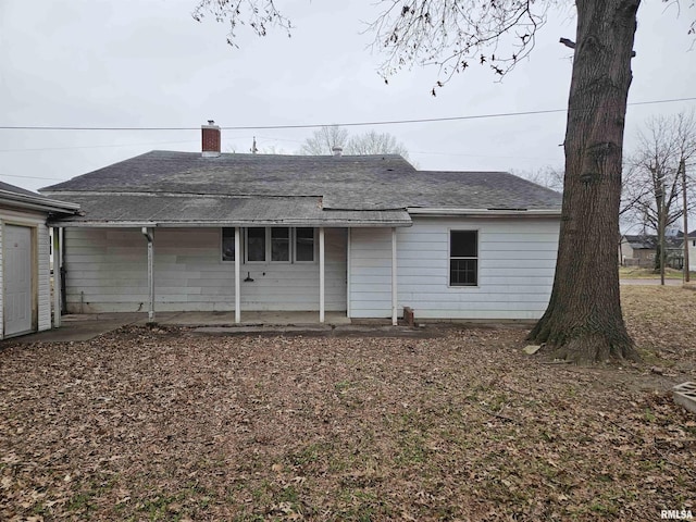 rear view of house featuring a patio