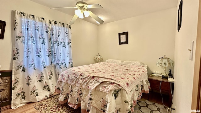 1807 E Saint Louis St, West Frankfort, IL 62896 - bedroom featuring wood finished floors and ceiling fan
