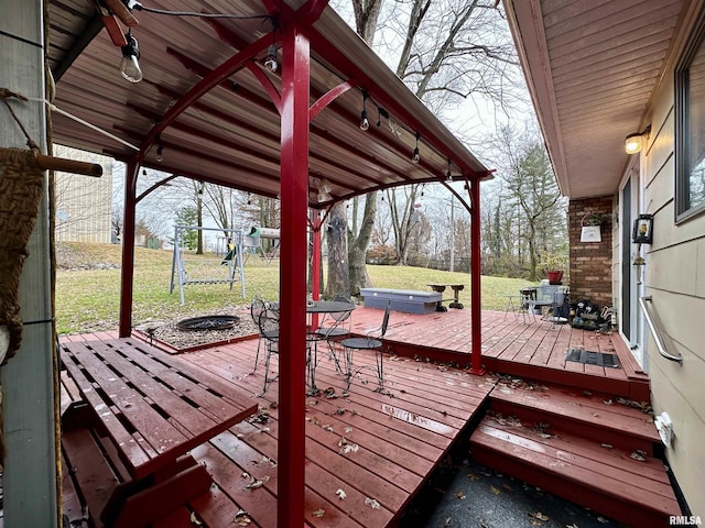 1807 E Saint Louis St, West Frankfort, IL 62896 - wooden deck with a fire pit and a lawn