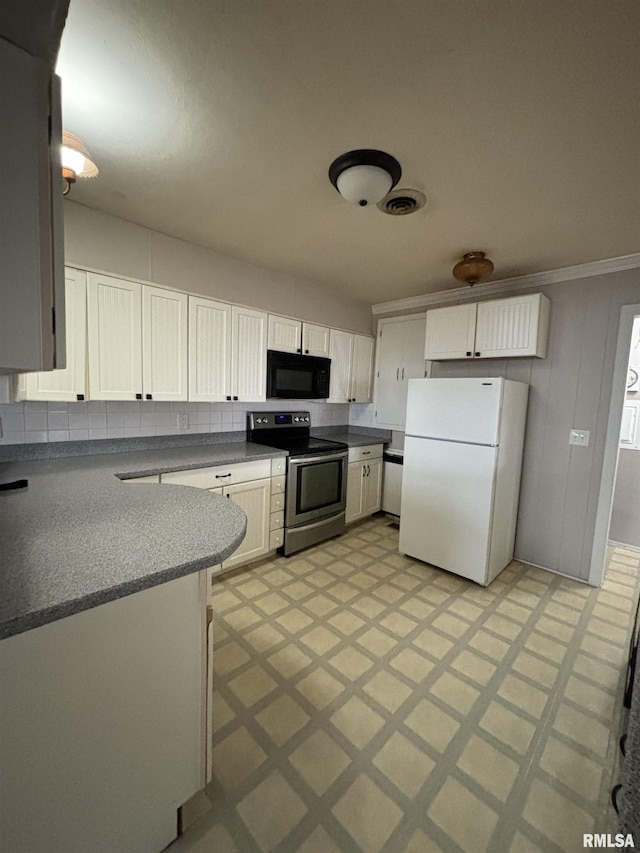 kitchen featuring white cabinetry, tasteful backsplash, white refrigerator, crown molding, and stainless steel electric range