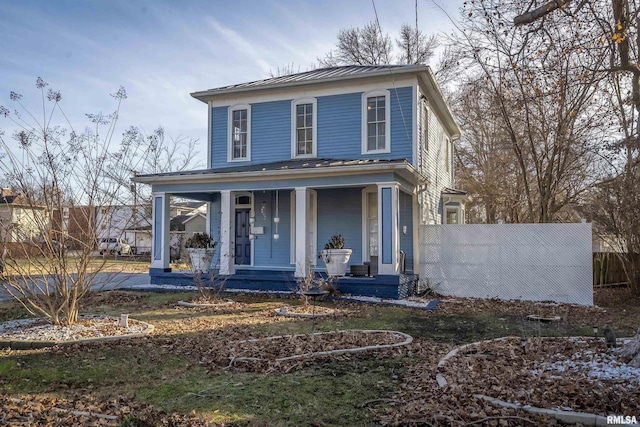 view of front of property featuring covered porch