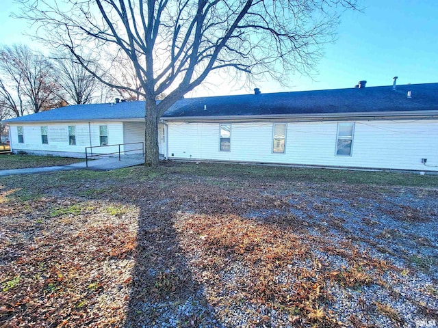 back of property featuring a patio area