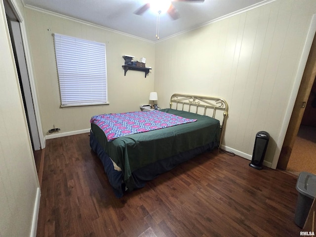 bedroom with ceiling fan, dark hardwood / wood-style floors, and crown molding