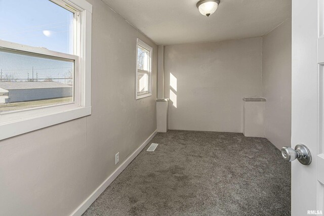 spare room with plenty of natural light