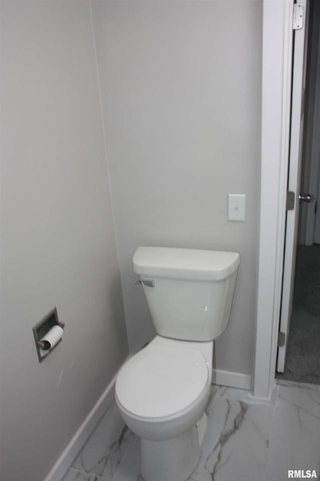 bathroom featuring toilet