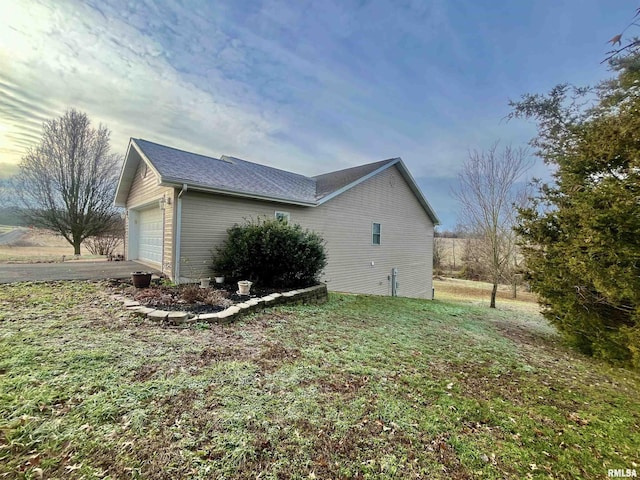 view of home's exterior with a garage