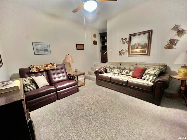 living room featuring carpet flooring and ceiling fan