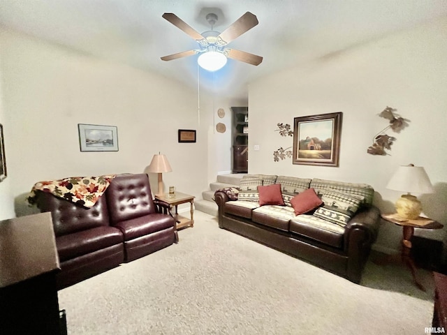 living room featuring carpet floors and ceiling fan