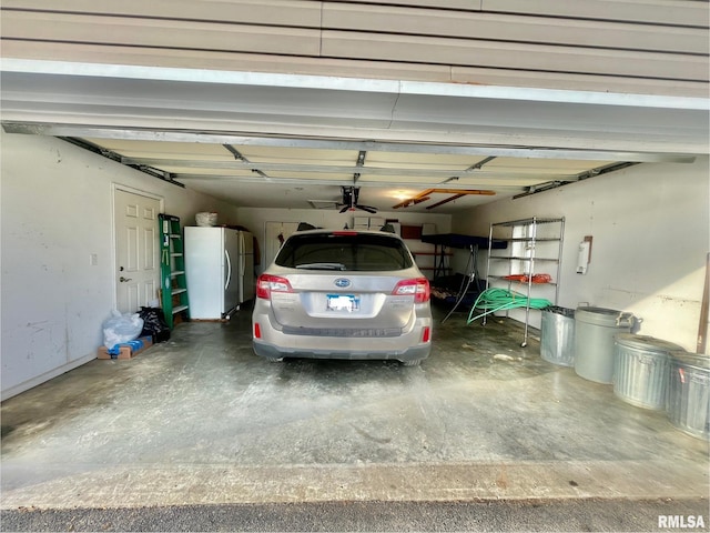 garage with white fridge