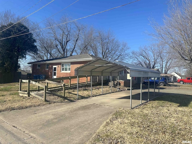 view of home's exterior featuring a carport