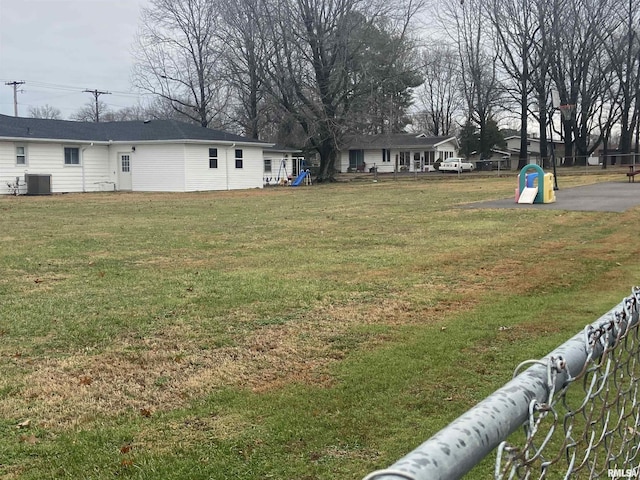 view of yard with central AC unit