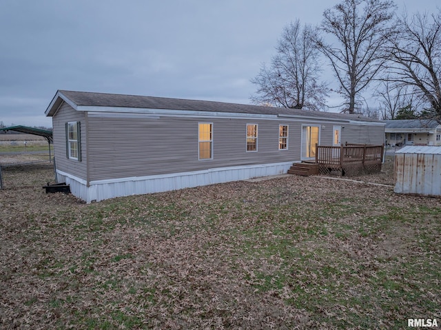 408 W Kirkwood St, Odin, IL 62870 - rear view of property featuring a deck