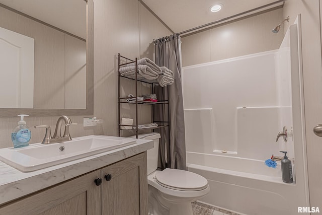 full bathroom with shower / bath combination with curtain, toilet, and vanity