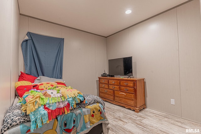 bedroom with light wood-type flooring