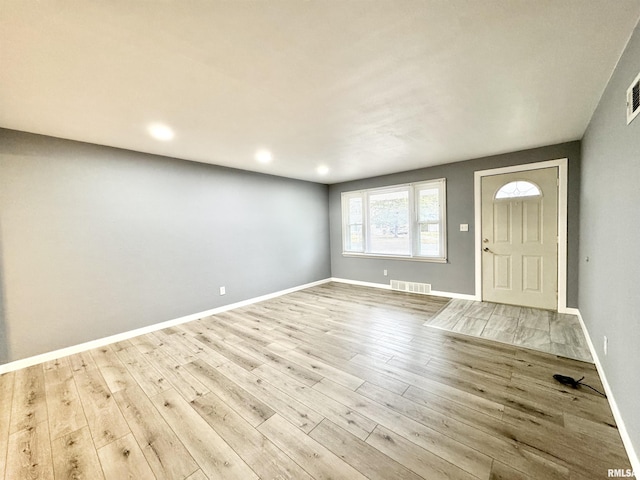 entrance foyer featuring light wood-type flooring