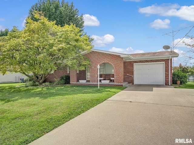 view of front facade featuring a front yard and a garage