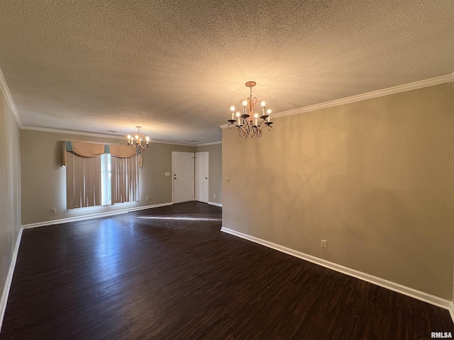 empty room with ornamental molding, dark hardwood / wood-style flooring, and a notable chandelier