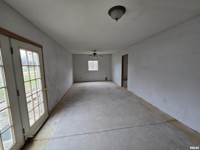 unfurnished room featuring ceiling fan