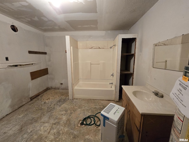 bathroom featuring vanity, concrete floors, and bathtub / shower combination