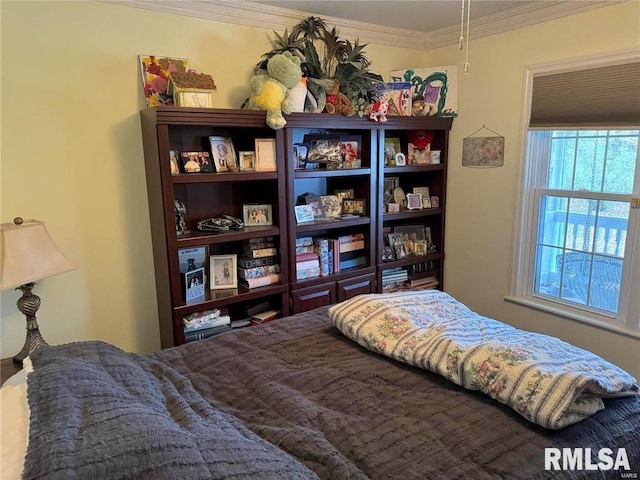 bedroom with ornamental molding