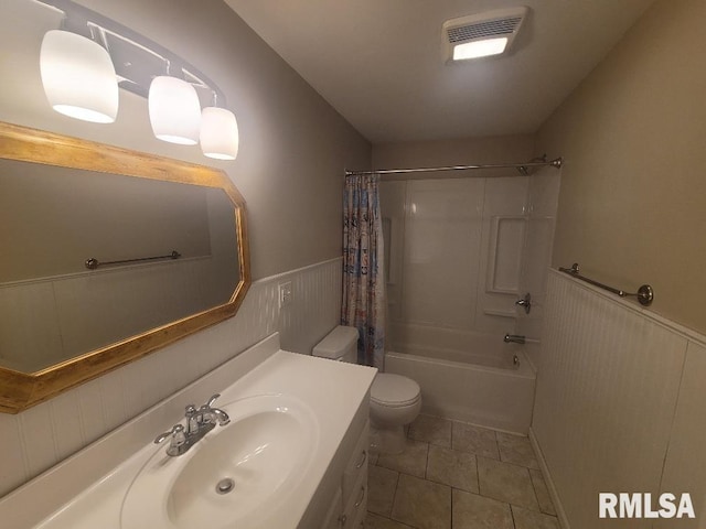 full bathroom featuring tile patterned floors, vanity, shower / bathtub combination with curtain, toilet, and wood walls