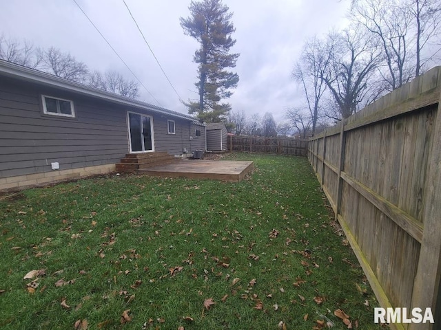 view of yard featuring a wooden deck