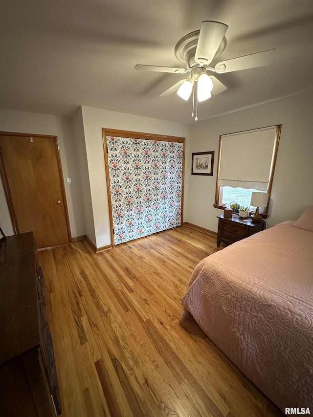 bedroom featuring ceiling fan and light wood-type flooring