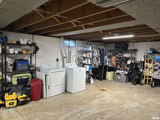 basement with washing machine and clothes dryer